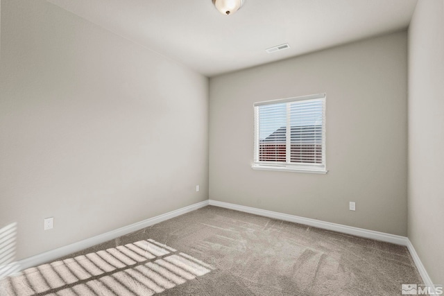 view of carpeted spare room