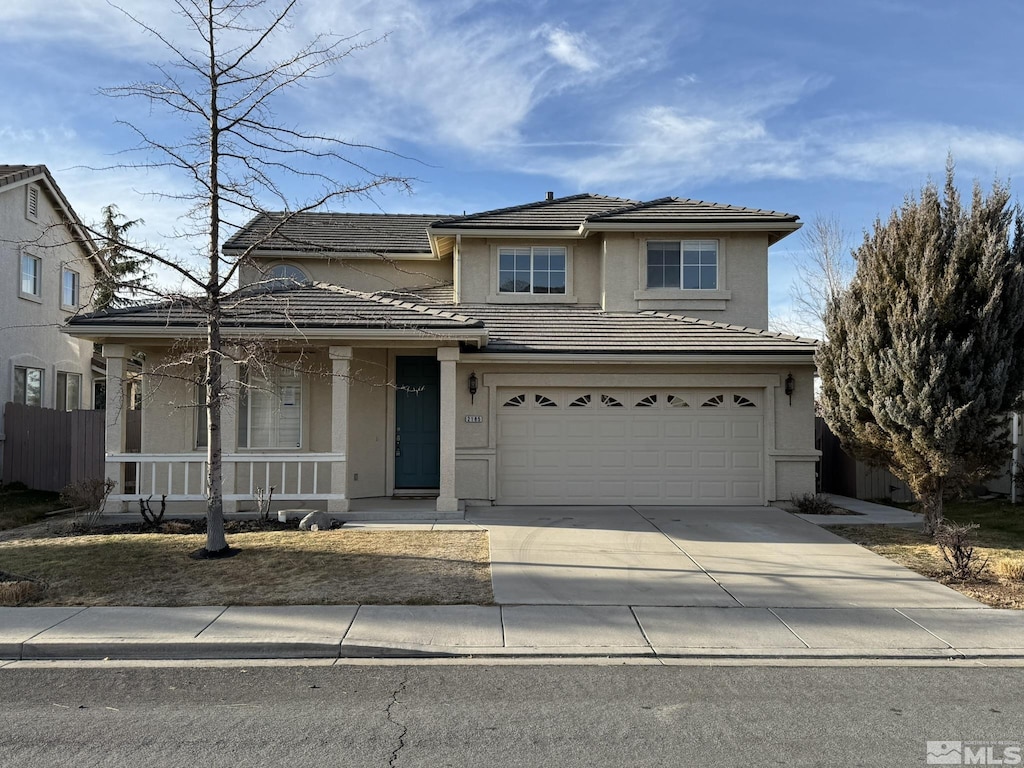 view of property featuring a garage