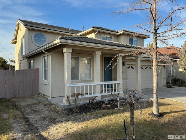 view of front facade with covered porch and a garage