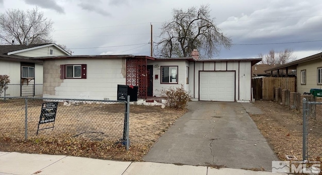 single story home featuring a garage