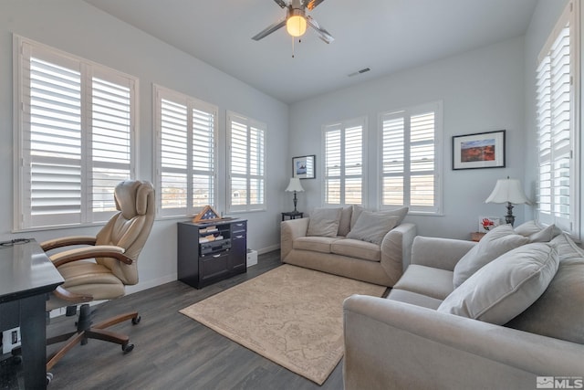 office space with ceiling fan and dark hardwood / wood-style flooring