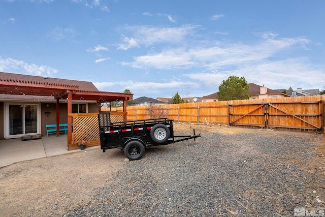 view of yard with a pergola and a patio area