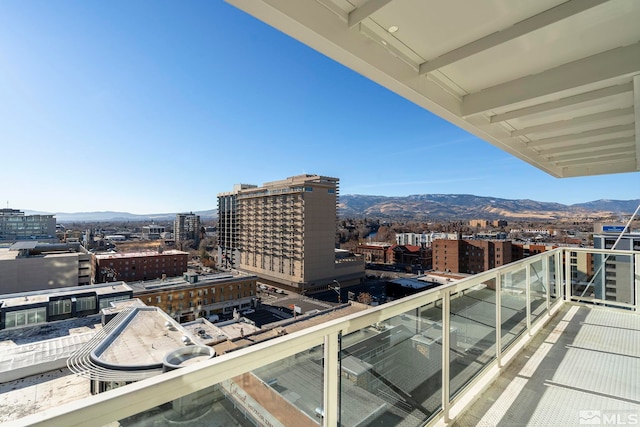 balcony featuring a mountain view