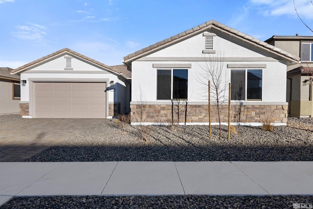 view of front of property featuring a garage