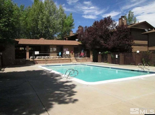 view of pool with a patio