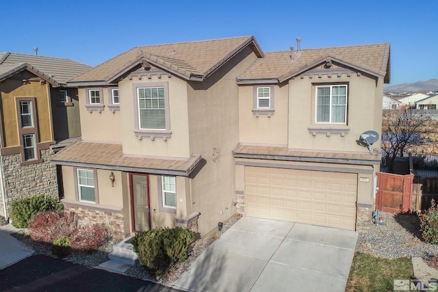 view of front of property featuring a garage