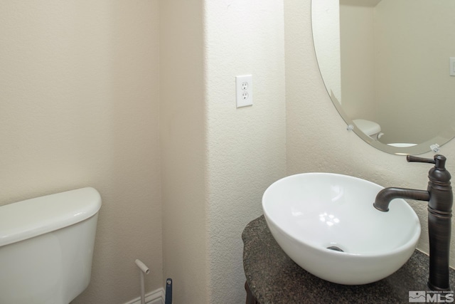 bathroom with sink and toilet