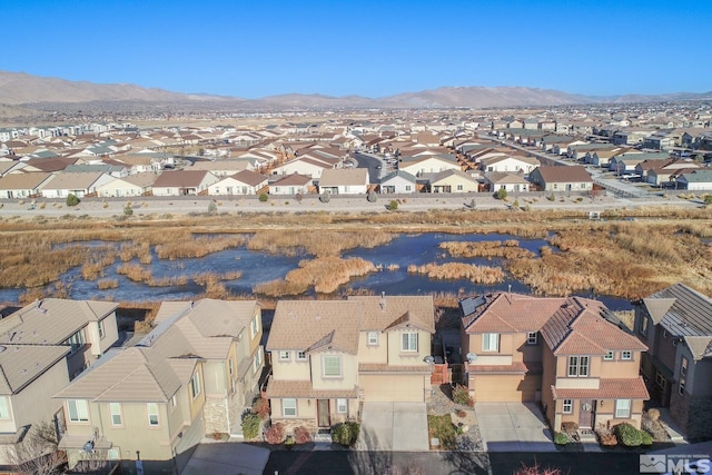 bird's eye view with a mountain view