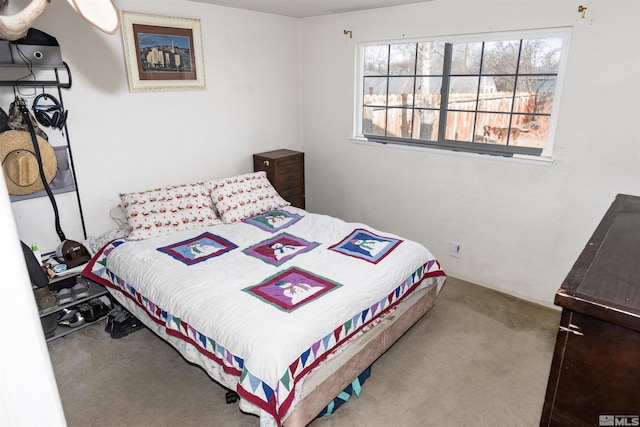 bedroom featuring carpet flooring