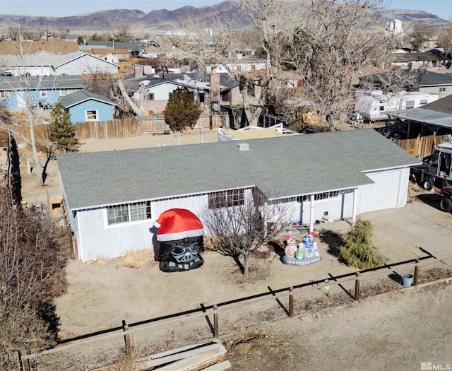 birds eye view of property featuring a residential view and a mountain view