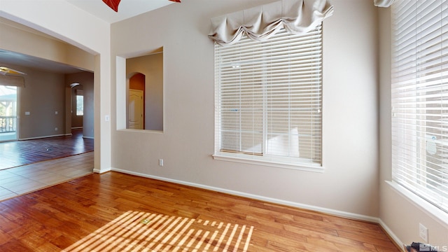 spare room with light wood-type flooring