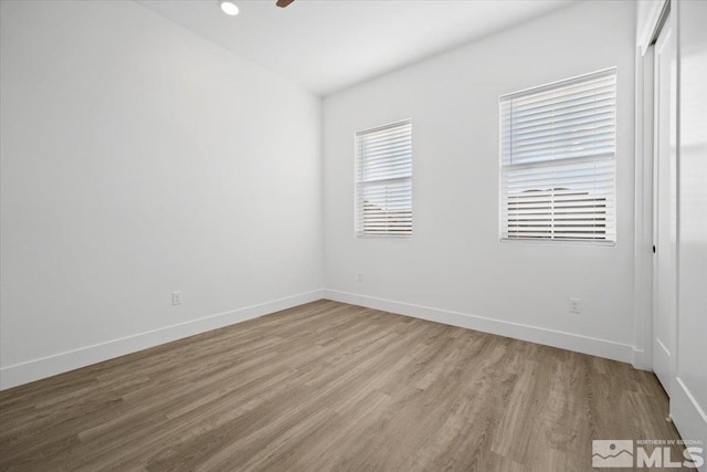 empty room with light wood-type flooring