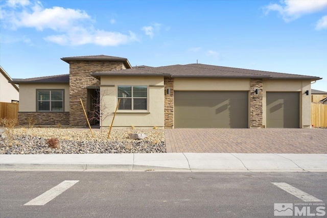 prairie-style home with a garage