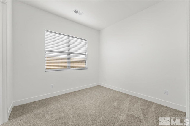 unfurnished room with carpet floors