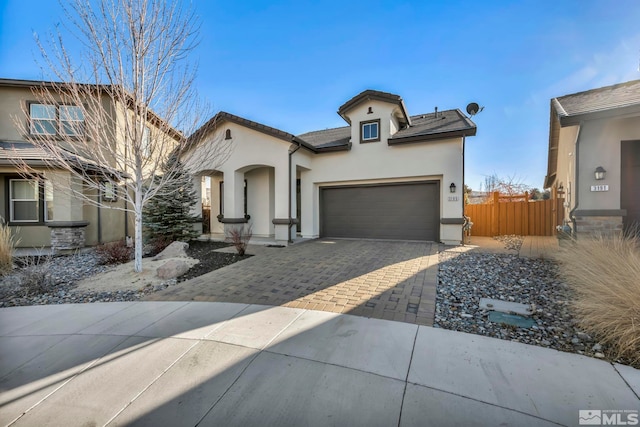 view of front of home with a garage