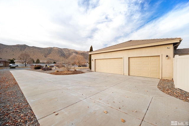 exterior space featuring a mountain view