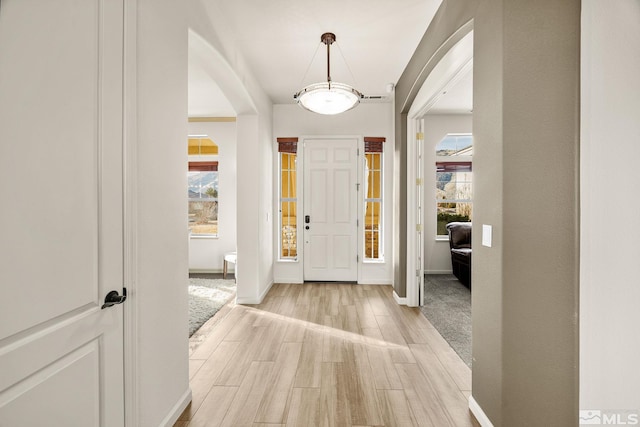 foyer entrance featuring light wood-type flooring