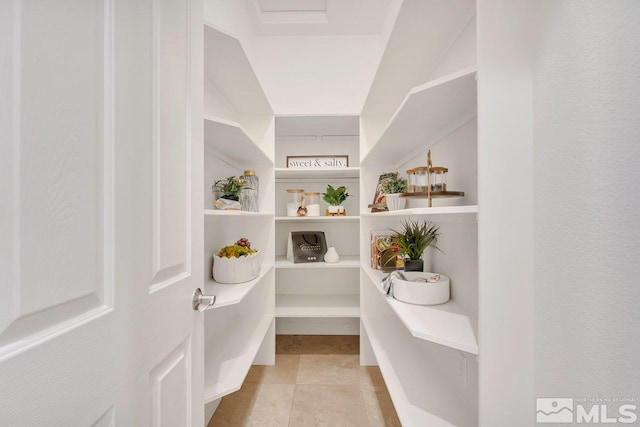 interior space featuring light tile patterned flooring