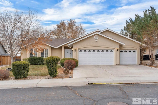 single story home with a garage