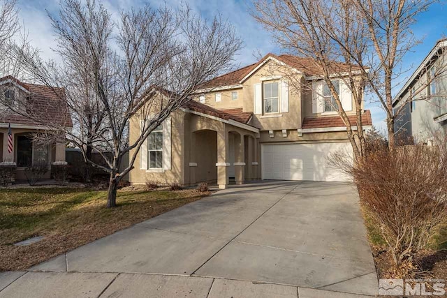 view of property featuring a garage