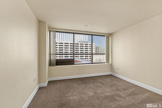 unfurnished room featuring carpet floors