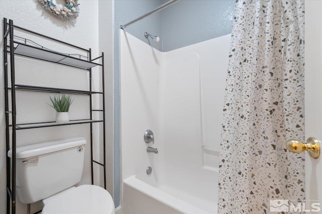 bathroom with  shower combination and toilet