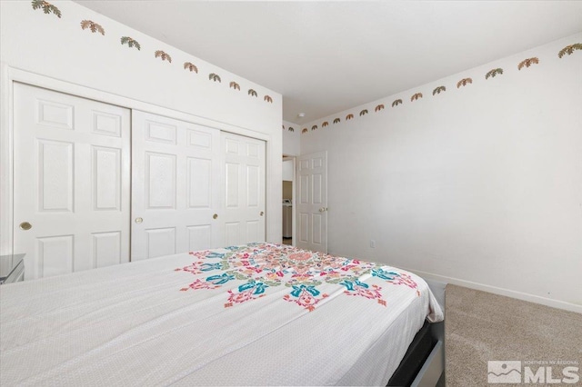 carpeted bedroom with a closet