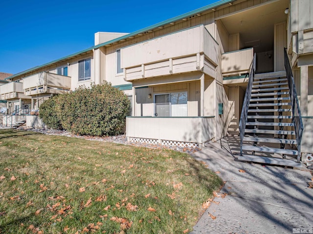 view of home's exterior featuring a lawn