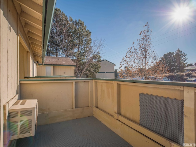 balcony with a wall unit AC