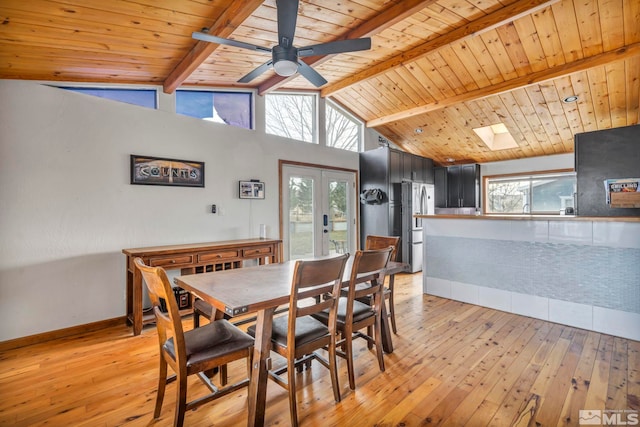 dining room with wooden ceiling, french doors, lofted ceiling with beams, and light wood-type flooring