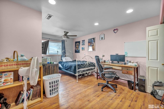 bedroom featuring hardwood / wood-style floors and ceiling fan