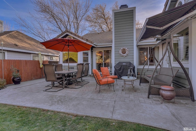 patio terrace at dusk with grilling area