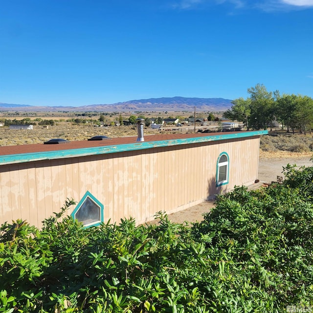 exterior space featuring a mountain view