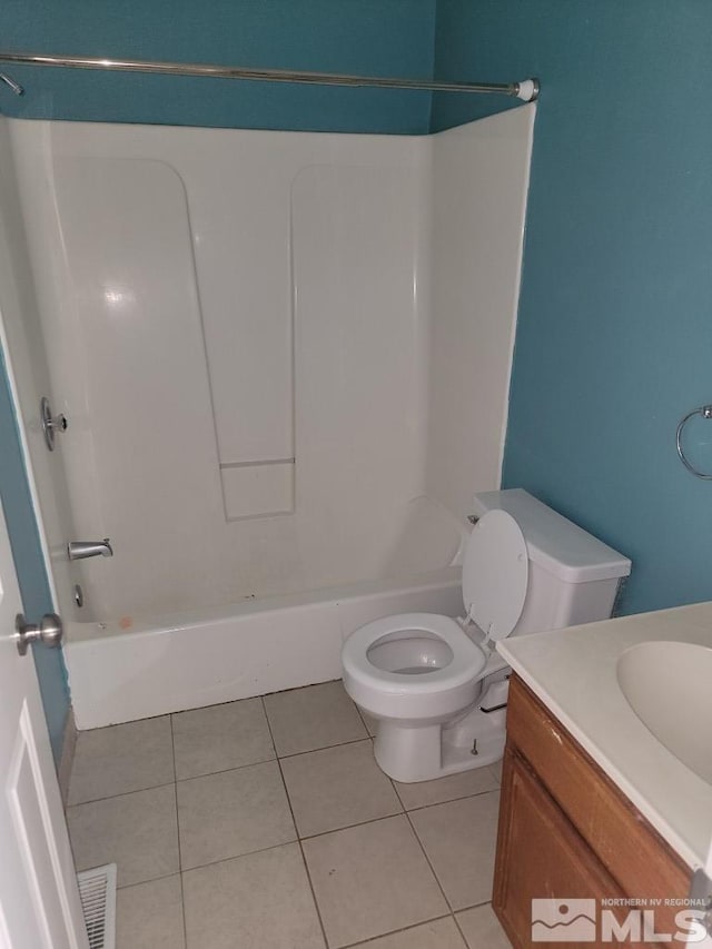 full bathroom featuring tile patterned flooring, vanity, toilet, and bathtub / shower combination