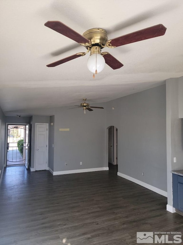 unfurnished living room with dark hardwood / wood-style floors