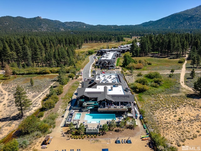 drone / aerial view featuring a mountain view