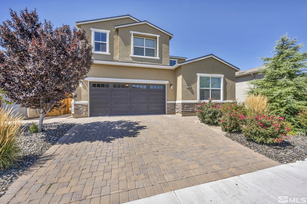 view of front of home featuring a garage