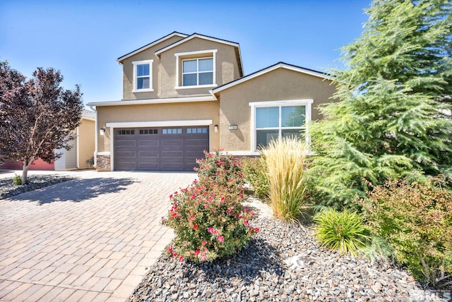 view of front of home with a garage