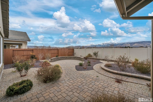 view of patio with a mountain view