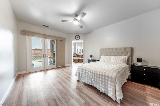 bedroom featuring french doors, ceiling fan, access to exterior, connected bathroom, and light hardwood / wood-style floors