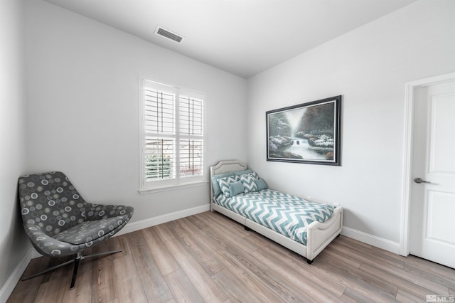 bedroom featuring light hardwood / wood-style floors