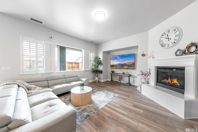 living room featuring light wood-type flooring