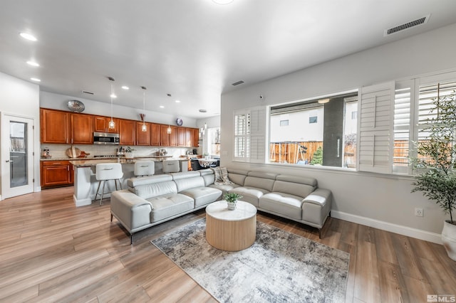 living room featuring light wood-type flooring