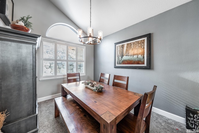 dining space with vaulted ceiling, carpet, a chandelier, and baseboards