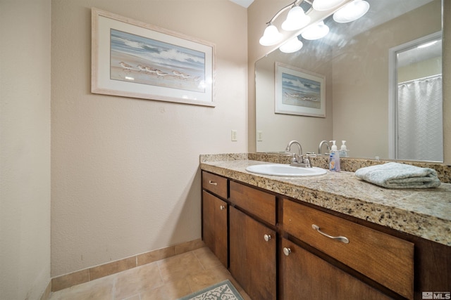 bathroom with vanity and tile patterned floors