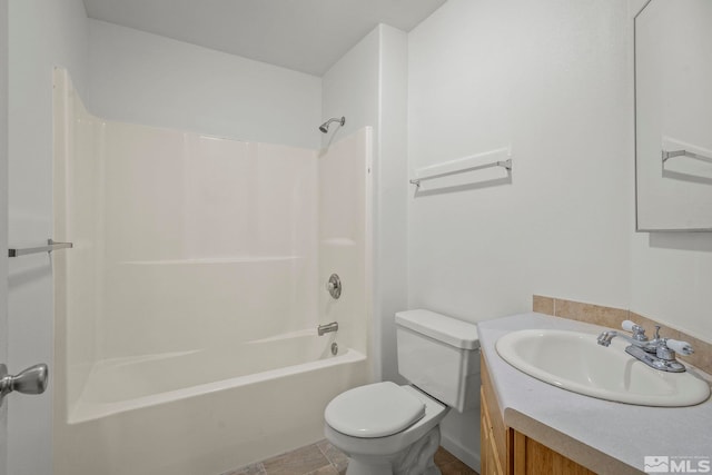 full bathroom with washtub / shower combination, vanity, and toilet