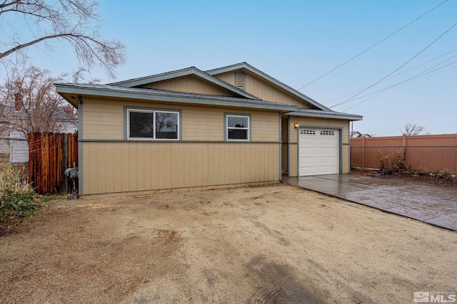 view of front of home with a garage