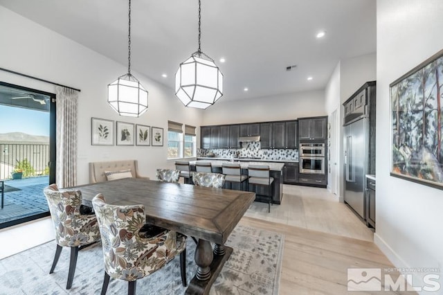 dining space featuring light hardwood / wood-style flooring