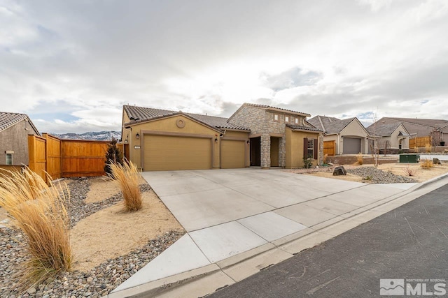 view of front of home featuring a garage