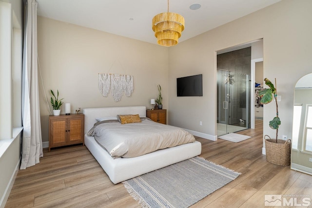 bedroom with hardwood / wood-style flooring